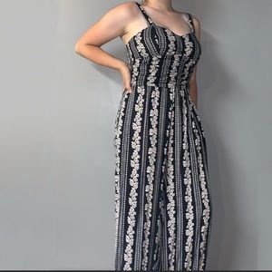 Black Jumpsuit With Floral Stripes